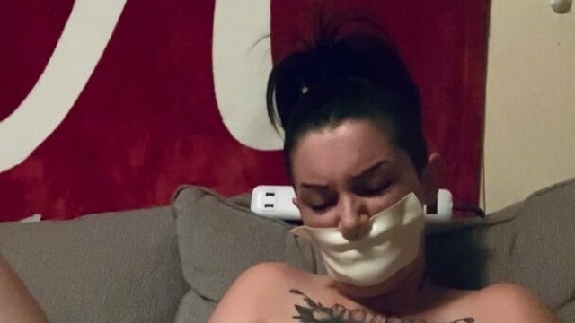 Tape gagged goth babe use wand and squirts! Big orgasm!